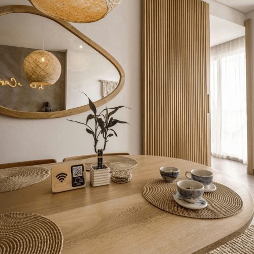 Stylish Scandinavian-inspired dining room interior with modern decor elements.